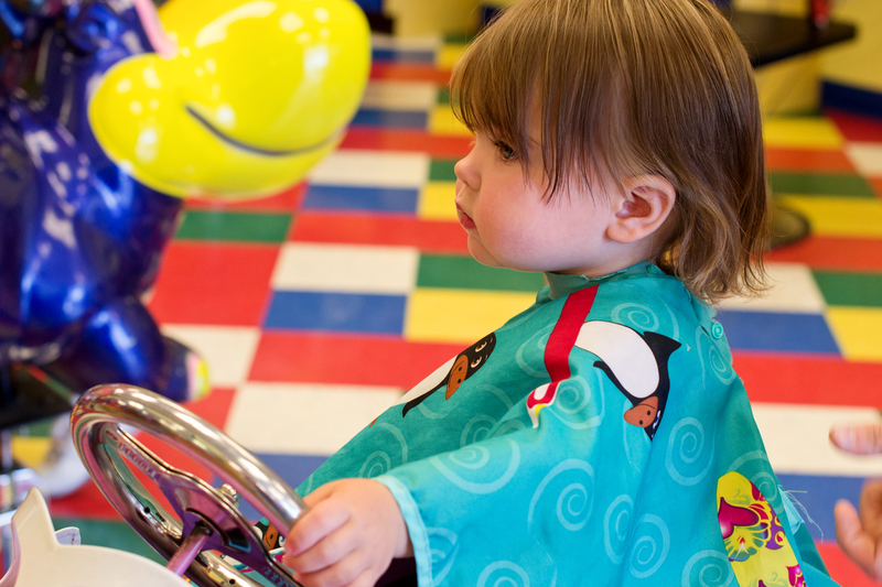 Getting her first "professional" haircut