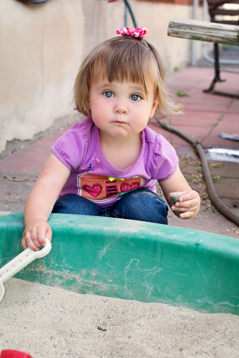 I warned her to keep the sand in the box. "Am I in trouble, Mom?"
