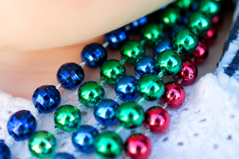 She sure loves her necklaces!