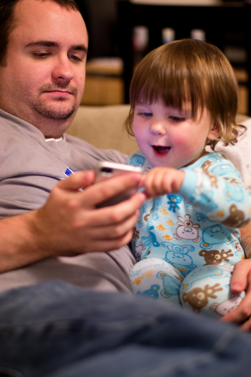 Playing with Daddy's phone makes everything better