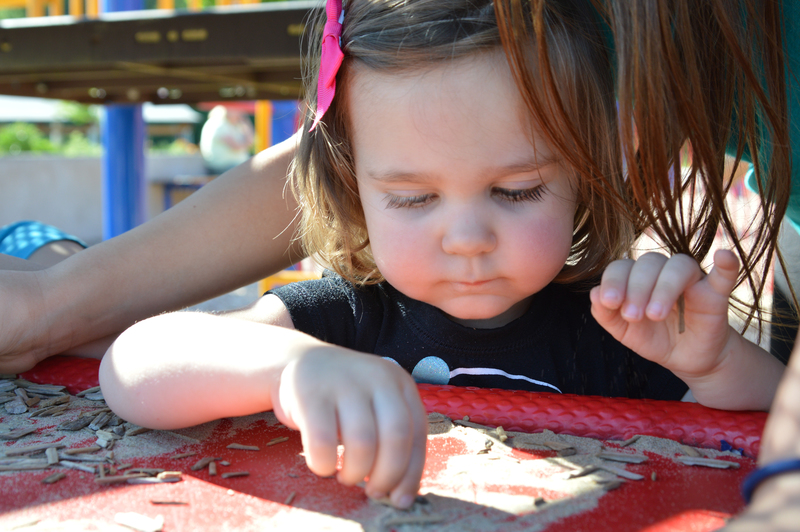 Trying to pick up the sand
