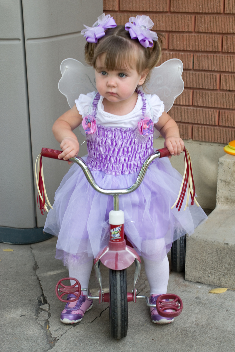 Playtime! And of course Em goes straight for the bike =)