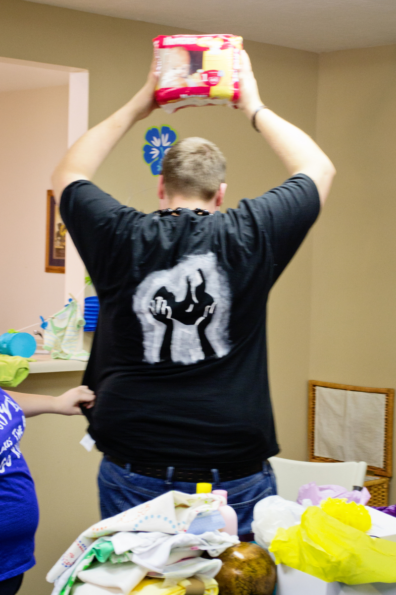 Practicing the Lion King pose depicted on his shirt