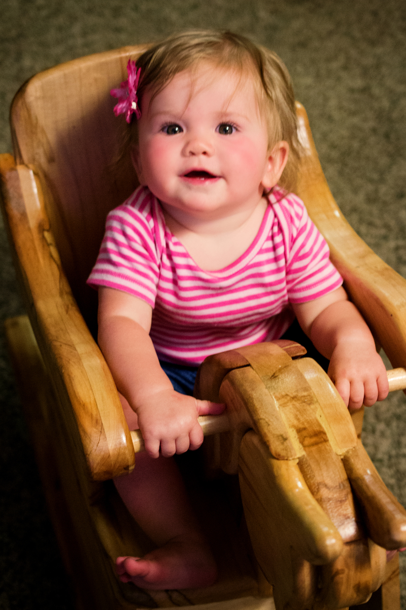 Becca likes the rocking horse chair