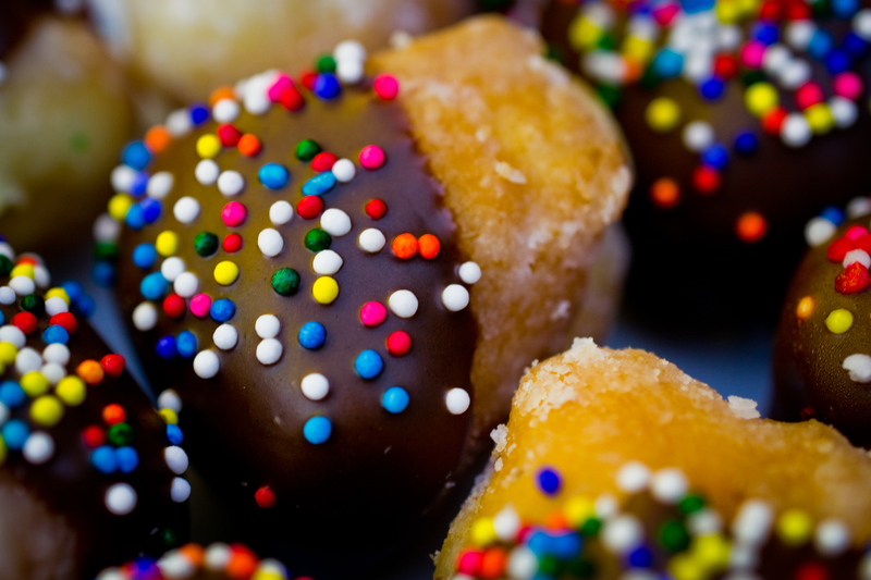 Old Fashioned Donut Holes, dipped in chocolate and covered in sprinkles
