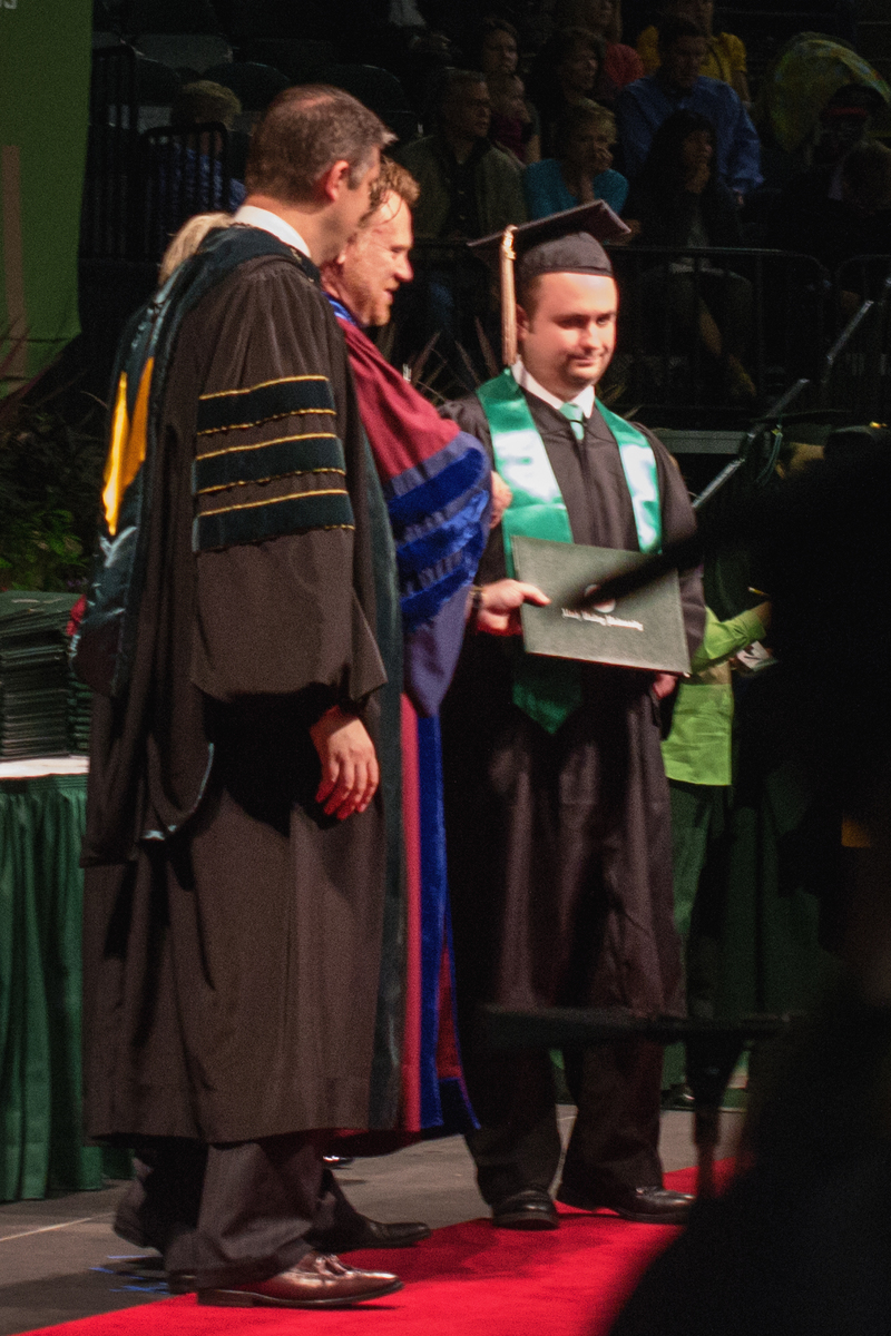 Getting his diploma