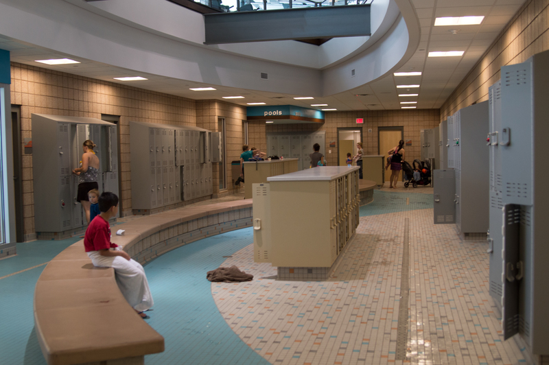 The lounge itself serves as a hallway of sorts. It's where you can undress if you have a swimsuit underneath. The lockers require you to bring your own combination lock.