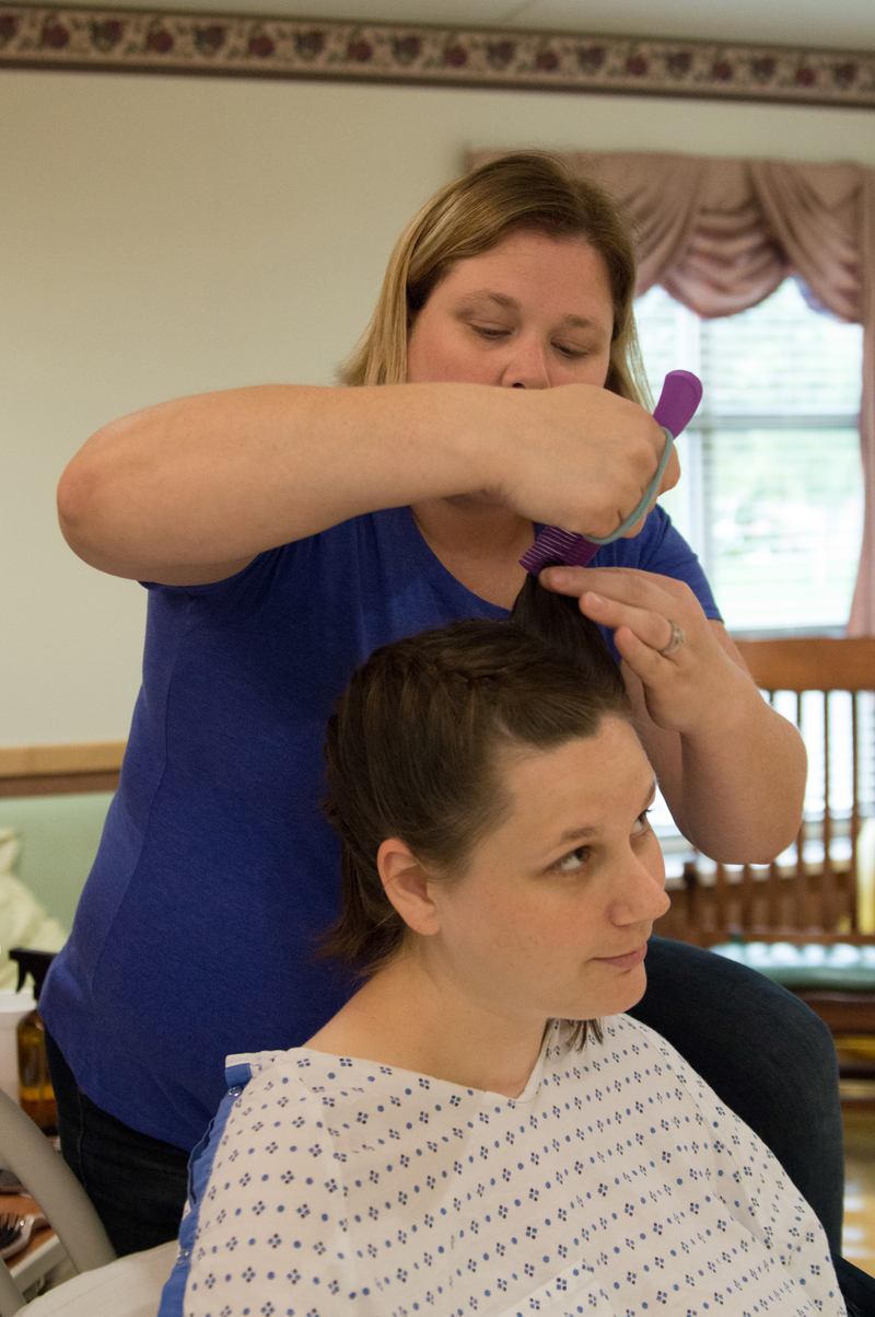 Larissa does Stacia's hair