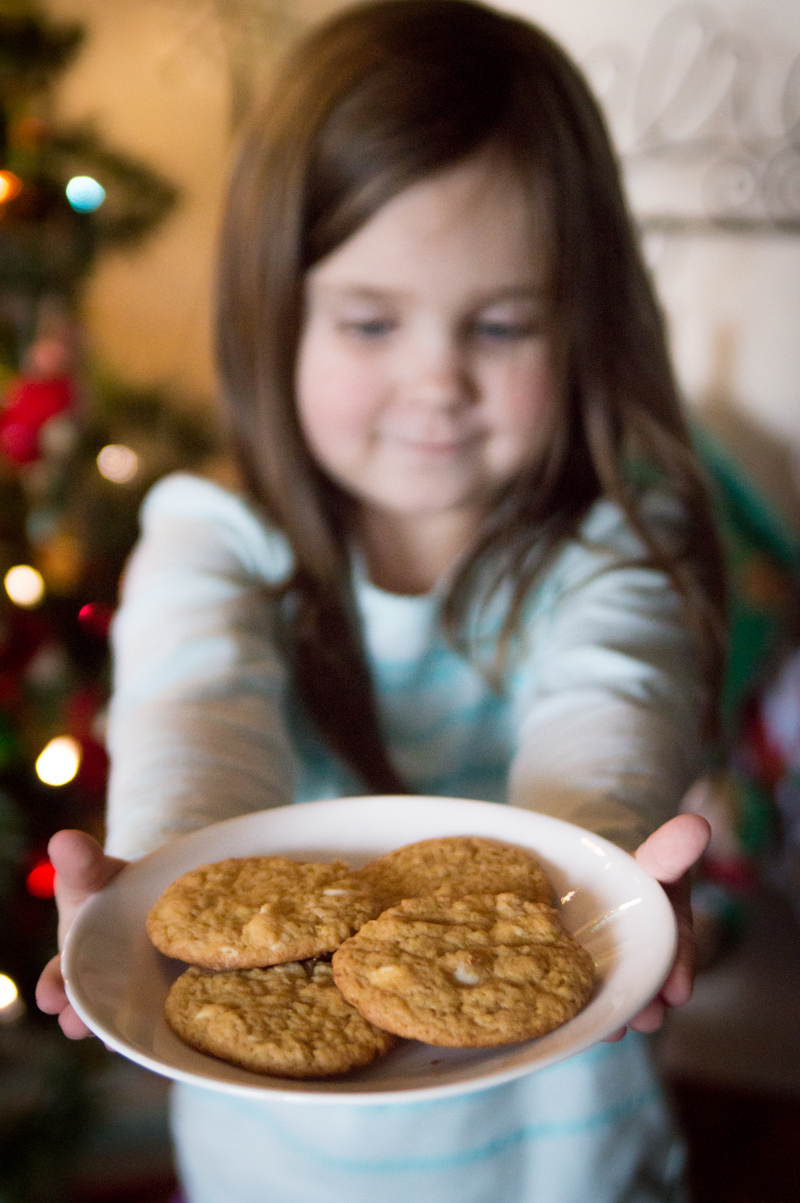 Em shows off the cookies she helped make for Santa